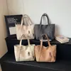 Bolso tote grande, simple y elegante, perfecto para ir al trabajo y para uso casual, ideal para estudiantes universitarios en 2026, un bolso de hombro moderno para la escuela y el uso diario