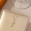 Colar Cruz de Aço Titânio para Mulheres, Cobre Micro-Incustado com Banho de Ouro Real, Corrente de Clavícula Corrente de Pescoço Exquisita Versátil Tendência Venda Quente Transfronteiriça