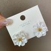 Pendientes de camelia de lujo con luz francesa y aguja plateada, pendientes de hada de gran sentido del temperamento, diseño único, pendientes con sentido al por mayor