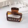 Pinza para el pelo grande de acetato estilo coreano, simple y elegante, con un toque de alta gama, diseño calado para la parte posterior de la cabeza