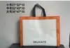 Bolsa no tejida de color spot recubierta con prensado en caliente bolsa de regalo publicitaria bolsa de compras de ropa no tejida portátil impresión de logotipo