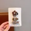 Tecido cor de café desenho animado presilha de cabelo infantil laço xadrez pérola presilha de tecido totalmente revestida presilha para franja de bebê sem danificar