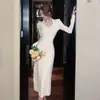 Ropa de Mujer de Comercio Exterior Toma Real: Vestido de Punto para Mujer, Nuevo Diseño Otoño e Invierno 2023, Vestido Largo Halter con un Toque Francés