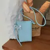 Bolso bandolera moderno y elegante, nuevo modelo primavera 2026, bolso de hombro tipo cubo simple, bolso casual y texturizado para teléfono móvil