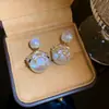 Pendientes de Perla de Circonita de Moda de Aguja Plateada Pendientes de Botón Retro de Lujo Ligero de Nicho Francés Pendientes Nuevos 2026