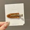 Pinza para el pelo de terciopelo con forma de corazón y perlas, estilo coreano, color block, nuevo modelo otoño e invierno 2026, pinza de pico de pato para frente y laterales
