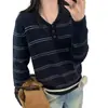 Nueva colección Otoño-Invierno 2026 para mujer: suéter a rayas holgado, cómodo y agradable para la piel, con cuello mandarín y estampado de oso mielero