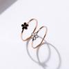 Moda japonesa y coreana acero de titanio oro rosa Margarita anillo de pegamento blanco y negro personalidad femenina temperamento ins anillo de dedo de flor