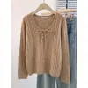 Suéter de punto para mujer con cuello en V y patrón trenzado, cordón, lazo, atado, top de suéter holgado y adelgazante, moda otoño 2026