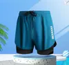 Bañador de doble capa holgado transfronterizo para hombre, anti-vergüenza, pantalones deportivos para correr para hombre, transpirables, secado rápido, bañador para aguas termales