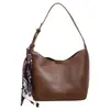 Bolso de hombro para mujer elegante y moderno de estilo coreano, diseño retro, sensación de alta gama, bolso cruzado de moda, versátil para ir al trabajo, bolso tipo cubo único