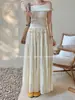 Xiu Xixi 2026 Primavera Nueva Etiqueta Blanca Elegante Falda Larga Plisada de Cintura Alta Estilo Francés para Mujer 85378