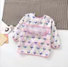 Paraguas niños impermeable babero manga larga mameluco impermeable bebé tafetán de poliéster para bebé ropa de comedor impermeable al por mayor