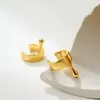 Pendientes de diseño de alta gama de moda europea y americana, chapados en cobre oro de 18 quilates, pendientes de gota de lava líquida, clip para el cartílago del oído