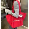 Bolso de mano tipo tote grande de lona informal estilo coreano para mujer, adecuado para el uso diario, bolso de mano rojo versátil
