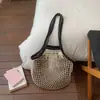 Bolsa de Playa Nueva Color-Block Primavera 2026 Bolsa Tejida Hueca de Malla para Vacaciones Picnic Viaje Bolso de Hombro Único