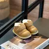 Botas de nieve impermeables de cuero para niños, nuevo modelo de invierno 2026, botas gruesas de algodón para niños, botines antideslizantes para niñas