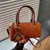 Bolsas de mano de moda transfronterizas para mujer, nueva colección de otoño 2026: bolsos de hombro retro y versátiles, bolsos cruzados, bolsos cilíndricos y bolsos tote