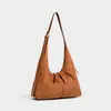 Bolsa de Ombro Única Fashionável com Toque de Camurça Retrô 2026 Nova Bolsa Tote Grande Capacidade Bolsa de Axila com Toque de Luxo