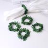 Anel de flor de Natal de rattan transfronteiriço, porta-guardanapo de arame, guirlanda de folhas verdes, fivela de guardanapo, porta-guardanapo, decoração de restaurante, mesa