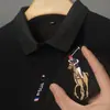 Negocio Comercio exterior Verano 2023 Camiseta de manga corta para hombre Bordada Talla grande Camisa polo Joven y de mediana edad Color liso Top