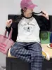 Conjunto de Camiseta de Manga Larga para Niñas para Primavera y Otoño 2026 Nuevo Estilo Ropa de Otoño para Niñas Grandes Pantalones Casuales a Cuadros Modernos