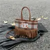 Bolso de Borla de Lujo Accesible de Gama Alta para Otoño e Invierno para Mujer 2025 Nuevo Bolso Bandolera Retro Marrón de Moda