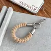 2026 nuevo cordón trenzado hecho a mano para teléfono, cadena de teléfono de hilo grueso, mezcla multicolor, estilo trendy de Instagram, directo del fabricante