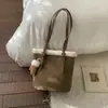 Bolso Retro de Nicho Esmerilado con Pelo de Cordero para Mujer 2025 Nuevo Versátil para Viajar al Trabajo Bolso de Hombro Axila Bolso de Mensajero Bolso Cubo