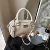 Bolso Pequeño Exterior de Textura Única de Alta Calidad para Mujer 2025 Nuevo Moderno Súper Popular Bolso de Hombro Cruzado Portátil Bolso Almohada de Trabajo