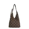 Bolso de axila de lunares con diseño de nicho coreano, bolsa de tela informal de temperamento elegante, bolso de hombro único para mujeres que van al trabajo