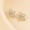 Brincos de Flor Gota de Óleo Galvanizados com Zircônia Inserida Agulha de Prata 925 Brincos de Tachinha Simples de Luxo Leve Versáteis e Elegantes