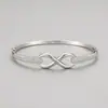 Pulseira de Prata Esterlina S925 Estilo Novo com Laço para Mulheres Europeias e Americanas, Design Moderno de Alto Padrão, Pulseira em Forma de Oito, Joia Elegante para Mão