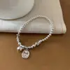 Pulseira Redonda de Carinha Sorridente com Contas Prateadas para Mulheres, Design de Nicho, Artesanato Pesado, Versátil, High-End, Pulseira de Design Simples