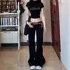 Pantalones vaqueros negros de corte microcampanado Spice Girls para mujer, nuevos diseños de otoño e invierno, cintura baja, corte ajustado, pierna ancha, corte recto y estilizado.
