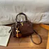 Bolso tote Boston acolchado para viajero transfronterizo, multicolor, moderno y exquisito, con un diseño suave tridimensional, fabricado en una fábrica