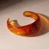 Pulsera Abierta Geométrica Redonda Colorida Resina Europea y Americana Manchada Retro Nicho de Gama Alta Joyería de Mano Personalizada Transfronteriza para Mujeres