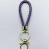 Venta al por mayor del fabricante Llavero de Cuerda de Aleación Tejida y Cuero Accesorios Colgantes Material PU Bolsas Pequeñas de Regalo Accesorios para Llaveros