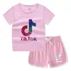 Camiseta de cuello redondo para niños, pantalones cortos, camiseta informal coreana, conjunto de camiseta interior absorbente de sudor, de caramelo, de verano 2023