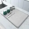 Venta al por mayor de fábrica tapete de drenaje mesa de lavado de cocina mesa de comedor mesa de bar tapete de mesa absorbente resistente al desgaste antideslizante lodo de diatomeas se puede usar para cabello