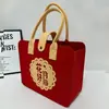 Bolsas de regalo de fieltro para el Festival de Medio Otoño, bolsas de regalo para pasteles de luna, bolsas de mano de fieltro para beneficios de empleados, bolsas pequeñas de fieltro para llevar, hechas a medida