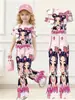 Conjunto de duas peças estilo rua para menina grande com estampa fofa, top de manga curta estilo coreano em desenho animado de seda de leite e calça boca de sino