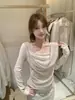 OFICIAL Otoño Blusa larga de estilo francés, transparente y brillante, con retazos, diseño de dos piezas simulado y escote fluido, 29026