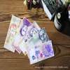 Cartera plegable de billetes del mundo creativa de fábrica, tendencia de moda, bolsa corta para tarjetas, billetera de lona para hombre y mujer, venta al por mayor