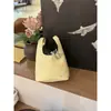 Bolso de Lona Decorado con Estrellas para Mujer 2026 Nuevo Estilo Coreano Diseño de Nicho Bolsa de Almacenamiento Portátil Linda Bolsa para Viajar