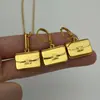 Nova Corrente de Clavícula em Ouro Sólido com Pingente em Formato de Bolsa, Brincos Estilo Europeu e Americano, Acessórios de Orelha com Design de Moda de Luxo Leve