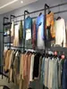 Estantería de exhibición para tienda de ropa estante de exhibición de pared estantes combinados estante de exhibición para tienda de ropa de hombre estante de exhibición para tienda de ropa de mujer colgado en la pared colgado en el lateral estante para ropa de niño