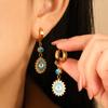 Pendientes de ojo de diablo exóticos de moda con personalidad europea y americana, diseño de nicho de estilo ins, pendientes de acero de titanio de alta calidad.