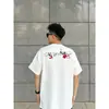 Camiseta de Algodão Puro com Bordado Floral na Frente e nas Costas, Manga Curta para Homens e Mulheres, Verão, Caimento Solto, Versátil, Estilo Americano, Gola Redonda, Manga Meia