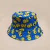 Nueva versión coreana de sombrero de pescador de patito amarillo de dibujos animados lindo para hombres y mujeres, sombrero de cubo de protección solar para exteriores, reversible, venta al por mayor